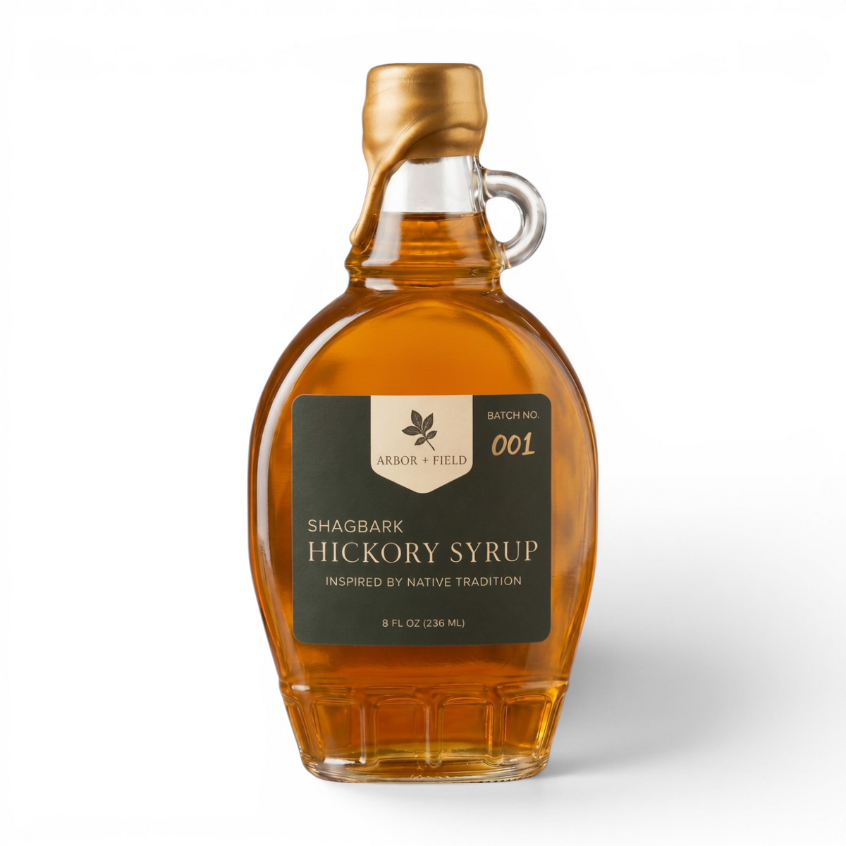 Shagbark Hickory Syrup 8 oz flask bottle with green and cream Arbor and Field Label on the front, a gold wax dipped cap and a handwritten gold batch number. Clean white background, premium look and feel. 